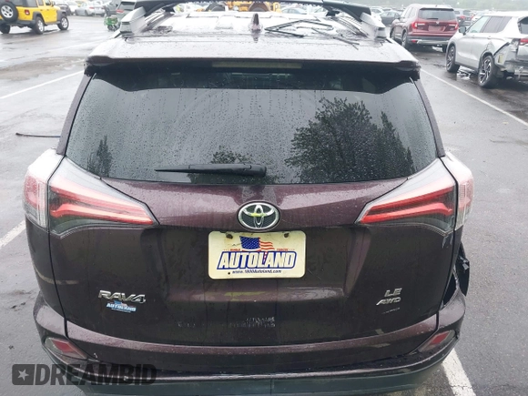 2018 Toyota RAV4 LE with VIN 2T3BFREV9JW857284, listed as a IAAI auction lot 42448480 with 85,551 mi miles and . Bid and sale history available at DreamBid. Image 16.