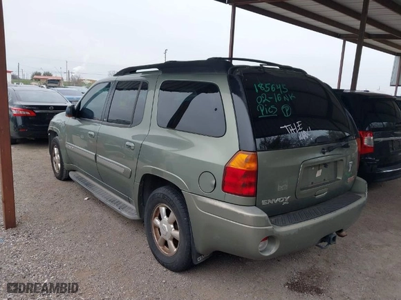 2004 GMC Envoy XL SLT with VIN 1GKET16SX46185645, listed as a IAAI auction lot 41605571 with 1 mi miles. Bid and sale history available at carsss.com. Image 3.
