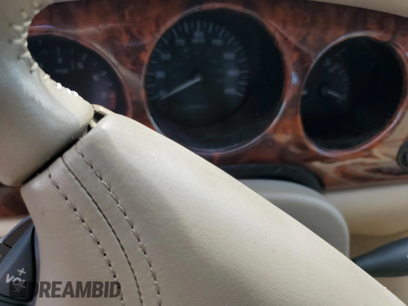 1999 Jaguar XJ with VIN SAJKX6047XC861227, listed as a Copart auction lot 75007414 with Not provided miles and Salvage title. Bid and sale history available at DreamBid. Image 9.
