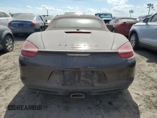 2014 Porsche Boxster z VIN WP0CA2A83ES120462, wystawiony jako Copart lot #74617404 z przebiegiem 23 055 mil mil oraz Nie do naprawy • Non repairable. Historia ofert i sprzedaży dostępna na DreamBid. Obrazek 6.