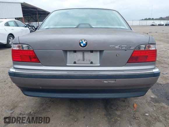 1998 BMW 7 Series 740il with VIN WBAGJ8323WDM23239, listed as a IAAI auction lot 41512630 with 221,673 mi miles. Bid and sale history available at carsss.com. Image 17.