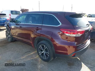 2018 Toyota Highlander LE with VIN 5TDZARFH0JS036002, listed as a IAAI auction lot 42281311 with 106,714 mi miles and . Bid and sale history available at DreamBid. Image 3.