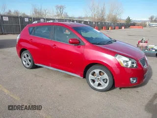 2009 Pontiac Vibe with VIN 5Y2SM67009Z401692, listed as a IAAI auction lot 41769199 with 143,904 mi miles. Bid and sale history available at carsss.com. Image 1.