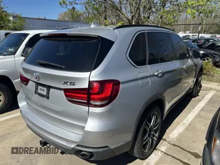 2015 BMW X5 xDrive35i with VIN 5UXKR0C57F0P14432, listed as a IAAI auction lot 42076389 with 119,109 mi miles. Bid and sale history available at carsss.com. Image 4.