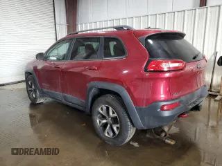 2015 Jeep Cherokee Trailhawk with VIN 1C4PJMBB8FW576765, listed as a Copart auction lot 49097925 with 299,877 mi miles and Clean Title. Bid and sale history available at DreamBid. Image 2.