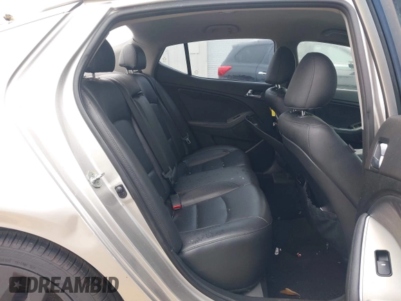 2015 Kia Optima SX with VIN 5XXGR4A73FG372494, listed as a IAAI auction lot 42345043 with 196,911 mi miles and . Bid and sale history available at DreamBid. Image 8.