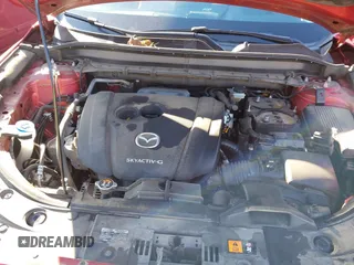 2020 Mazda CX-5 Grand Touring with VIN JM3KFADM8L0846818, listed as a IAAI auction lot 41224843 with 123,554 mi miles. Bid and sale history available at carsss.com. Image 10.