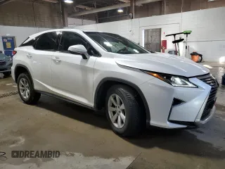 2017 Lexus RX with VIN 2T2BZMCA0HC114801, listed as a Copart auction lot 47135395 with 82,096 mi miles and Salvage Title. Bid and sale history available at carsss.com. Image 4.