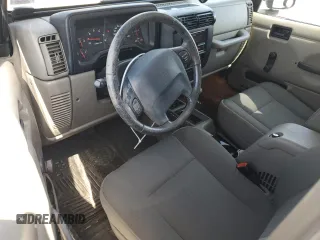 2003 Jeep Wrangler Sahara with VIN 1J4FA59S53P369077, listed as a Copart auction lot 61445025 with 147,904 mi miles and Clean title. Bid and sale history available at DreamBid. Image 8.