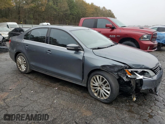 2012 Volkswagen Jetta Sedan SEL w/Sunroof with VIN 3VWLX7AJ7CM389484, listed as a Copart auction lot 83857594 with 212,348 mi miles and Salvage Title. Bid and sale history available at carsss.com. Image 4.