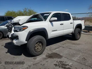 2020 Toyota Tacoma SR5 with VIN 3TMCZ5AN5LM353636, listed as a Copart auction lot 55164385 with 77,056 mi miles and Salvage title. Bid and sale history available at DreamBid. Image 1.