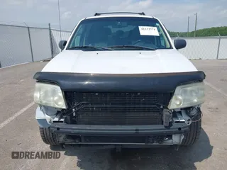2007 Mercury Mariner Premier z VIN 4M2CU87107KJ12711, wystawiony jako IAAI lot #42233771 z przebiegiem 182 355 mil mil oraz . Historia ofert i sprzedaży dostępna na DreamBid. Obrazek 6.
