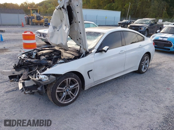 2015 BMW 4 Series 428i xDrive z VIN WBA4C9C57FD330866, wystawiony jako IAAI lot #40574326 z przebiegiem 123 726 mil mil oraz . Historia ofert i sprzedaży dostępna na DreamBid. Obrazek 18.