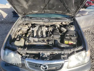 2000 Mazda 626 LX with VIN 1YVGF22D5Y5120152, listed as a Copart auction lot 44571595 with 177,624 mi miles and Salvage Title. Bid and sale history available at carsss.com. Image 11.