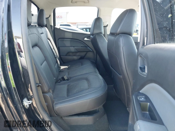 2018 Chevrolet Colorado 4WD Z71 z VIN 1GCGTDEN0J1173420, wystawiony jako IAAI lot #41971813 z przebiegiem 98 499 mil mil oraz . Historia ofert i sprzedaży dostępna na DreamBid. Obrazek 8.
