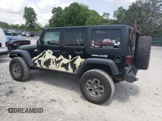 2014 Jeep Wrangler Unlimited Rubicon with VIN 1C4BJWFGXEL291187, listed as a Copart auction lot 54897675 with 227,478 mi miles and Salvage title. Bid and sale history available at DreamBid. Image 2.