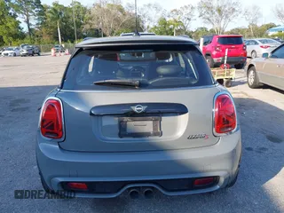 2020 MINI Hardtop Cooper S z VIN WMWXR5C00L2M23924, wystawiony jako IAAI lot #41520706 z przebiegiem 123 006 mil mil oraz . Historia ofert i sprzedaży dostępna na DreamBid. Obrazek 16.
