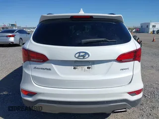 2017 Hyundai Santa Fe 2.4L z VIN 5NMZU3LB1HH045714, wystawiony jako IAAI lot #41949139 z przebiegiem 151 799 mil mil oraz . Historia ofert i sprzedaży dostępna na DreamBid. Obrazek 16.