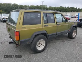1996 Jeep Cherokee Sport with VIN 1J4FJ68S9TL291661, listed as a Copart auction lot 71968934 with 139,695 mi miles and Salvage Title. Bid and sale history available at carsss.com. Image 3.