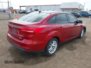 2015 Ford Focus SE with VIN 1FADP3F24FL323536, listed as a IAAI auction lot 41876148 with 221,050 mi miles. Bid and sale history available at carsss.com. Image 4.