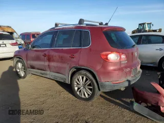2011 Volkswagen Tiguan SEL with VIN WVGBV7AX4BW001386, listed as a Copart auction lot 44495945 with 149,806 mi miles and Salvage Title. Bid and sale history available at DreamBid. Image 2.