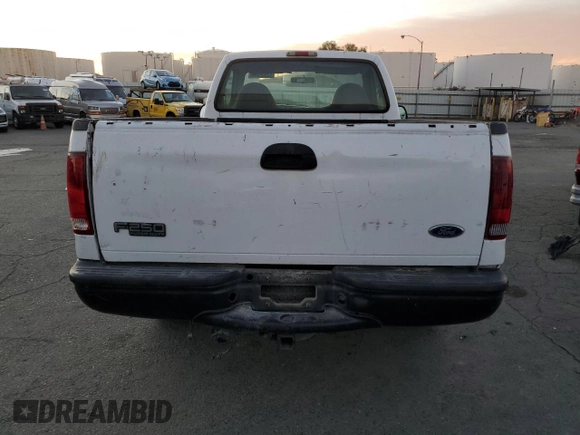 2002 Ford Super Duty F-250 XL with VIN 1FTNF20L32EA82290, listed as a Copart auction lot 82052494 with 133,019 mi miles and Clean Title. Bid and sale history available at carsss.com. Image 6.