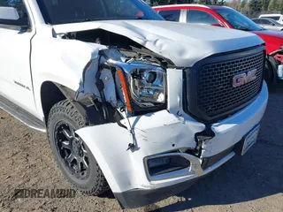 2019 GMC Yukon XL SLE z VIN 1GKS2FKC9KR147823, wystawiony jako IAAI lot #41571738 z przebiegiem 95 764 mil mil oraz . Historia ofert i sprzedaży dostępna na DreamBid. Obrazek 6.