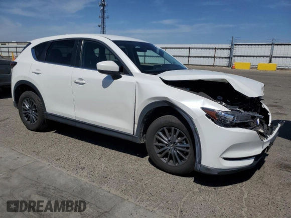 2020 Mazda CX-5 Touring z VIN JM3KFACM7L0833480, wystawiony jako Copart lot #58270225 z przebiegiem 46 061 mil mil oraz Szkoda całkowita • Salvage title. Historia ofert i sprzedaży dostępna na DreamBid. Obrazek 4.