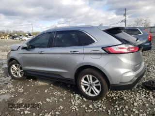 2020 Ford Edge SEL z VIN 2FMPK4J95LBA29912, wystawiony jako Copart lot #82968534 z przebiegiem 104 083 mil mil oraz Szkoda całkowita • Salvage title. Historia ofert i sprzedaży dostępna na DreamBid. Obrazek 2.