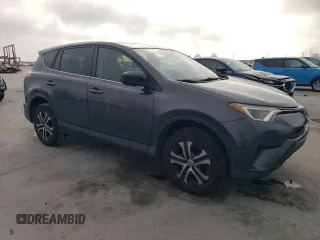 2018 Toyota RAV4 LE with VIN JTMBFREV8JJ260321, listed as a Copart auction lot 50588215 with 208,236 mi miles and Salvage title. Bid and sale history available at DreamBid. Image 4.