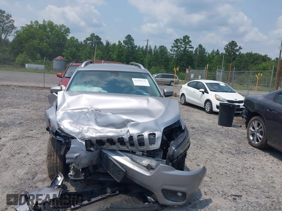 2019 Jeep Cherokee Latitude Plus with VIN 1C4PJLLB3KD184842, listed as a IAAI auction lot 42389142 with 123,324 mi miles and . Bid and sale history available at DreamBid. Image 12.