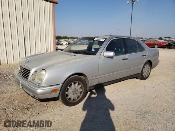 1998 Mercedes-Benz E-Class with VIN WDBJF65F1WA711193, listed as a Copart auction lot 76052034 with 168,935 mi miles and Salvage Title. Bid and sale history available at carsss.com. Image 1.