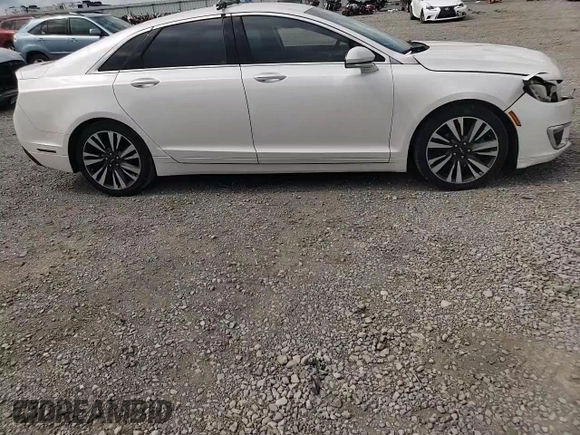 2017 Lincoln MKZ Select z VIN 3LN6L5C99HR644113, wystawiony jako Copart lot #59472605 z przebiegiem 68 444 mil mil oraz Szkoda całkowita • Salvage title. Historia ofert i sprzedaży dostępna na DreamBid. Obrazek 11.