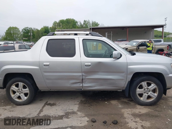2012 Honda Ridgeline RTL with VIN 5FPYK1F58CB454385, listed as a IAAI auction lot 42212805 with 207,874 mi miles and . Bid and sale history available at DreamBid. Image 13.