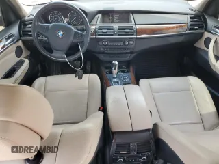 2012 BMW X5 35i с VIN 5UXZV4C58CL987049, выставлен на аукционе Copart как лот 61013925 с пробегом 167 508 миль миль и Чистый • Clean title. История ставок и продаж доступна на DreamBid. Изображение 8.