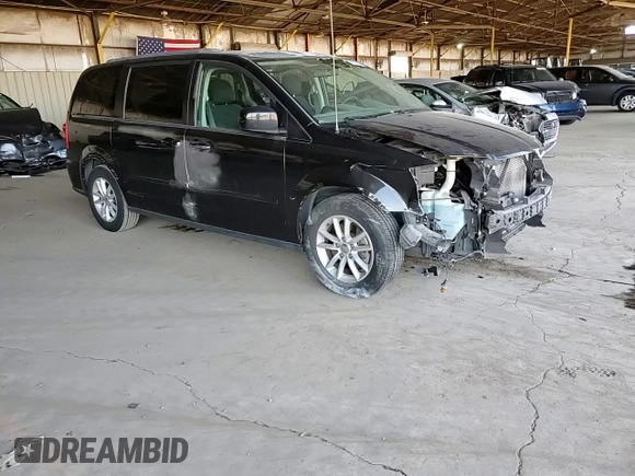 2015 Dodge Grand Caravan SXT with VIN 2C4RDGCG5FR632388, listed as a Copart auction lot 54719625 with 67,996 mi miles and Salvage Title. Bid and sale history available at DreamBid. Image 14.