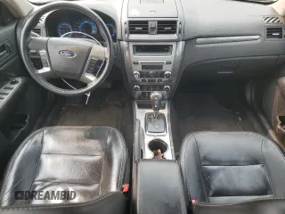 2012 Ford Fusion SEL z VIN 3FAHP0JG9CR412387, wystawiony jako Copart lot #58542715 z przebiegiem 143 112 mil mil oraz Czysty tytuł • Clean title. Historia ofert i sprzedaży dostępna na DreamBid. Obrazek 8.