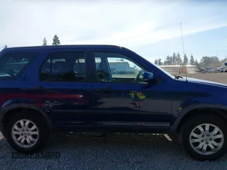 2005 Honda CR-V EX z VIN JHLRD78855C038069, wystawiony jako IAAI lot #42449026 z przebiegiem 217 102 mil mil oraz . Historia ofert i sprzedaży dostępna na DreamBid. Obrazek 14.