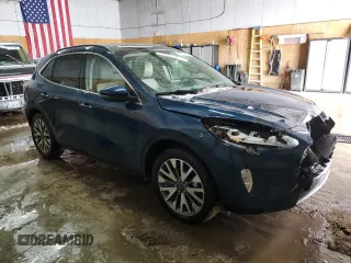 2020 Ford Escape Titanium Hybrid z VIN 1FMCU9DZ0LUA74302, wystawiony jako Copart lot #48614065 z przebiegiem 91 923 mil mil oraz Szkoda całkowita • Salvage title. Historia ofert i sprzedaży dostępna na DreamBid. Obrazek 4.