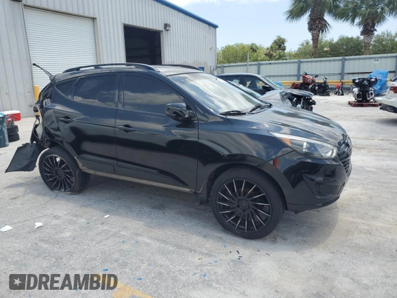 2010 Hyundai Tucson GLS with VIN KM8JU3AC2AU079129, listed as a Copart auction lot 54312875 with 116,659 mi miles and Salvage Title. Bid and sale history available at DreamBid. Image 4.