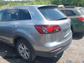 2015 Mazda CX-9 Touring with VIN JM3TB2CA2F0451180, listed as a IAAI auction lot 42180078 with 112,804 mi miles and . Bid and sale history available at carsss.com. Image 6.