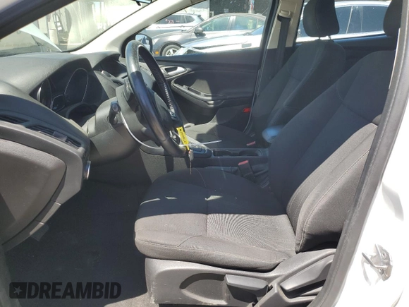 2016 Ford Focus SE with VIN 1FADP3F22GL329241, listed as a Copart auction lot 58095135 with 105,079 mi miles and Salvage title. Bid and sale history available at DreamBid. Image 7.