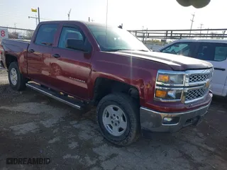 2014 Chevrolet Silverado 1500 LT with VIN 3GCUKREH4EG284122, listed as a IAAI auction lot 41667059 with 243,251 mi miles. Bid and sale history available at carsss.com. Image 1.