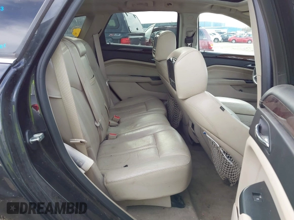 2013 Cadillac SRX Luxury Collection z VIN 3GYFNCE35DS607553, wystawiony jako IAAI lot #42151522 z przebiegiem 104 688 mil mil oraz . Historia ofert i sprzedaży dostępna na DreamBid. Obrazek 8.