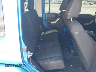 2016 Jeep Wrangler Unlimited Sahara with VIN 1C4HJWEG0GL154418, listed as a IAAI auction lot 41892333 with 102,410 mi miles and . Bid and sale history available at DreamBid. Image 8.