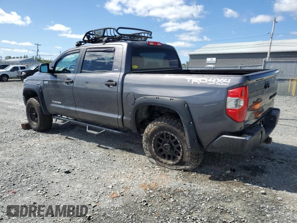 2014 Toyota Tundra 4WD Truck SR5 with VIN 5TFDY5F10EX400758, listed as a Copart auction lot 69950174 with 130,657 mi miles and Salvage Title. Bid and sale history available at carsss.com. Image 2.