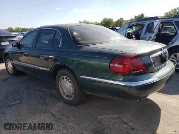 1998 Lincoln Continental with VIN 1LNFM97V8WY707809, listed as a Copart auction lot 70842654 with 175,066 mi miles and Salvage Title. Bid and sale history available at carsss.com. Image 2.