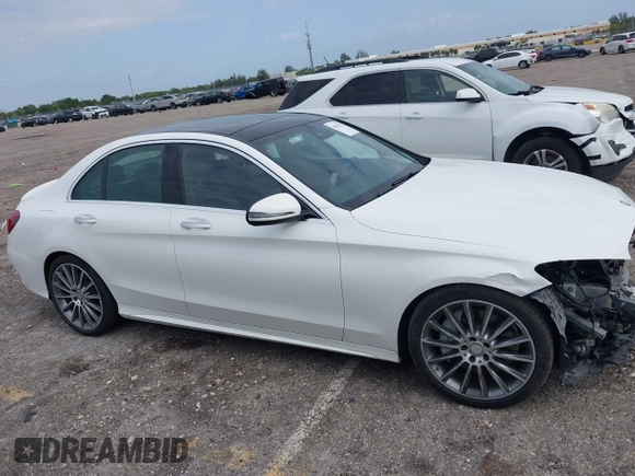 2016 Mercedes-Benz C 300 with VIN 55SWF4JB5GU131922, listed as a IAAI auction lot 42014152 with 52,041 mi miles and . Bid and sale history available at carsss.com. Image 14.