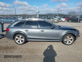 2014 Audi allroad A4 Premium Plus z VIN WA1UFAFL8EA133365, wystawiony jako IAAI lot #42034903 z przebiegiem 145 285 mil mil oraz . Historia ofert i sprzedaży dostępna na DreamBid. Obrazek 14.