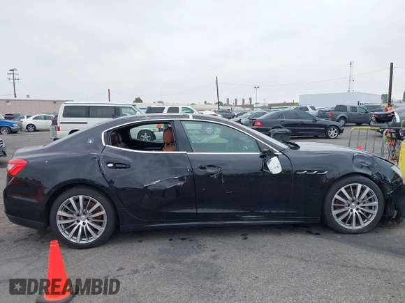 2015 Maserati Ghibli z VIN ZAM57XSA4F1151843, wystawiony jako IAAI lot #38392898 z przebiegiem 88 147 mil mil oraz . Historia ofert i sprzedaży dostępna na DreamBid. Obrazek 13.